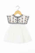 charming white embroidered frock