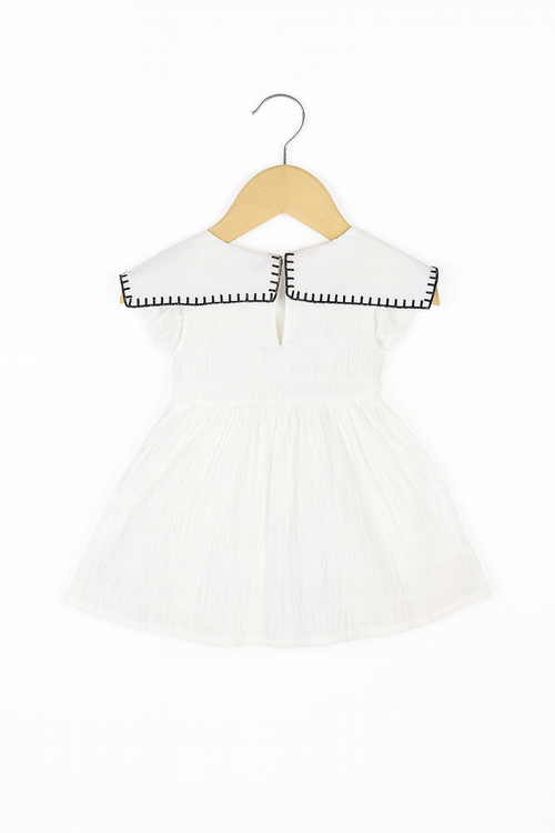 charming white embroidered frock