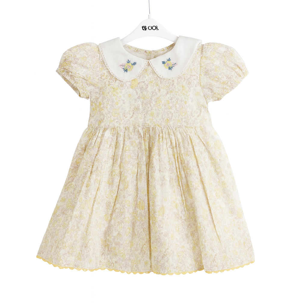 yellow floral frock is designed