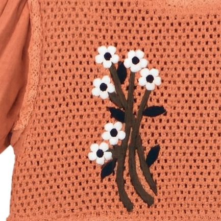 Adorable terracotta-colored girls’ frock