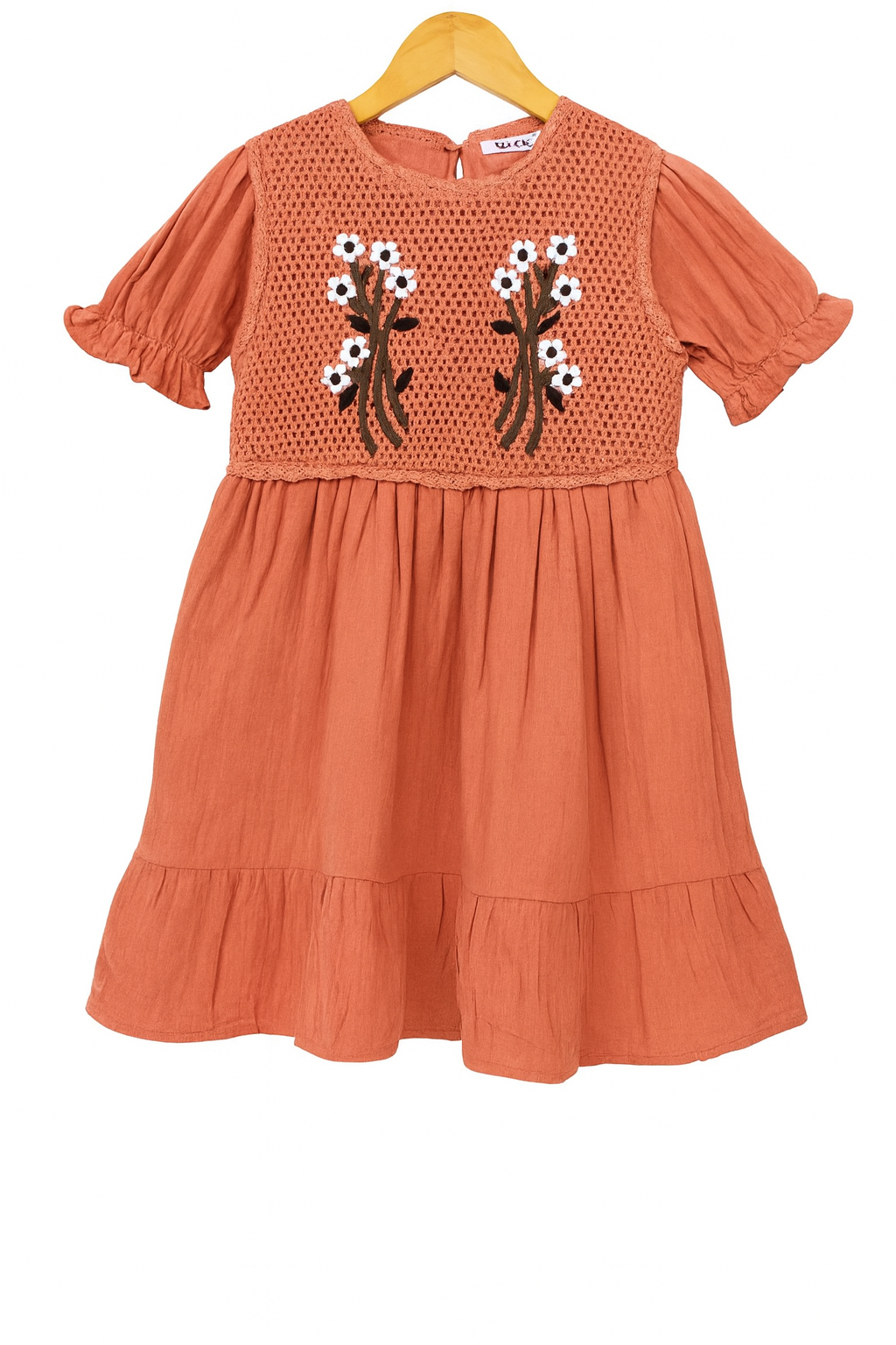 Adorable terracotta-colored girls’ frock
