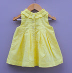Yellow Sleeveless Cotton Frock with chikan Eyelet Design