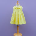 Yellow Sleeveless Cotton Frock with chikan Eyelet Design