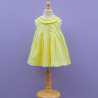 Yellow Sleeveless Cotton Frock with chikan Eyelet Design