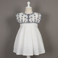 charming white embroidered frock