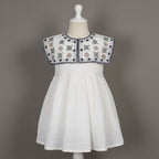 charming white embroidered frock