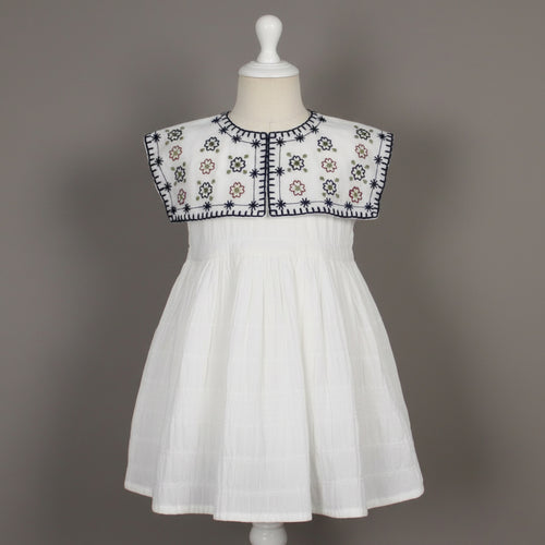 charming white embroidered frock